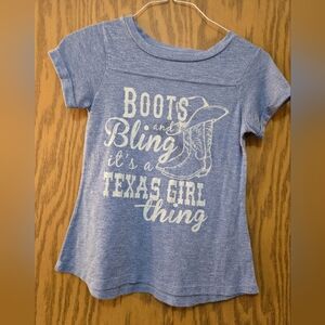 Pretty, light blue, short sleeve graphic t shirt. Great condition.  Size small